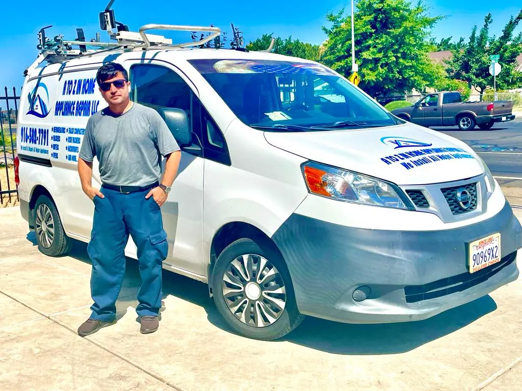 A to Z service van and technician at a customer home