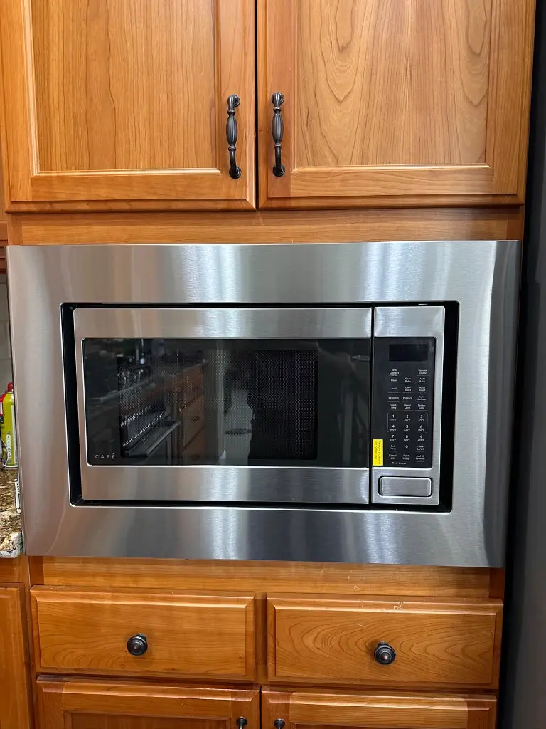 Built-in microwave installed in a kitchen cabinet