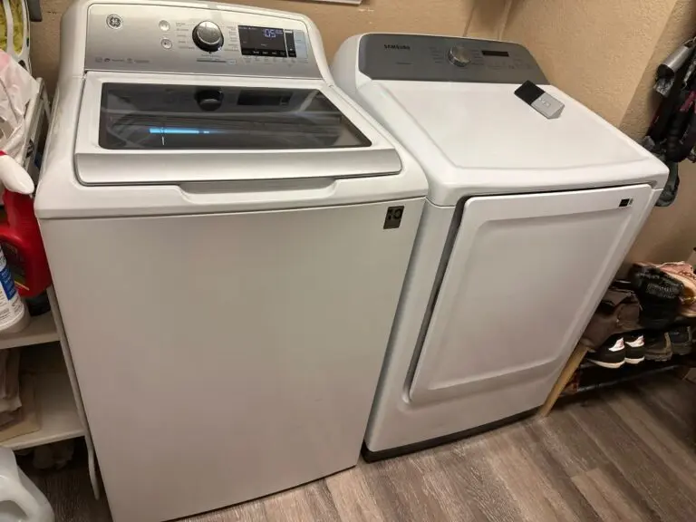 Pricing: Top-load washer and dryer pair in a laundry area